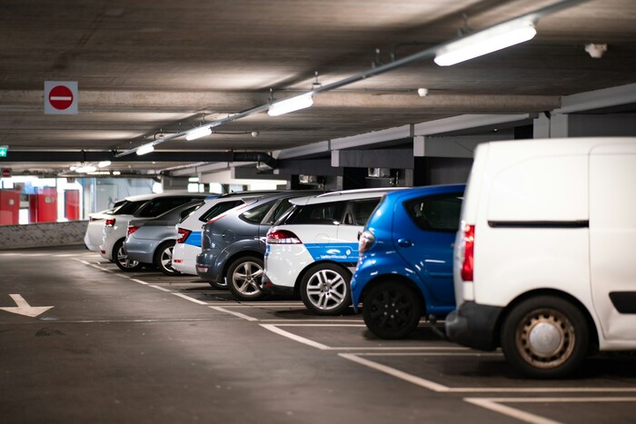 Cars parked in a covered parking lot
